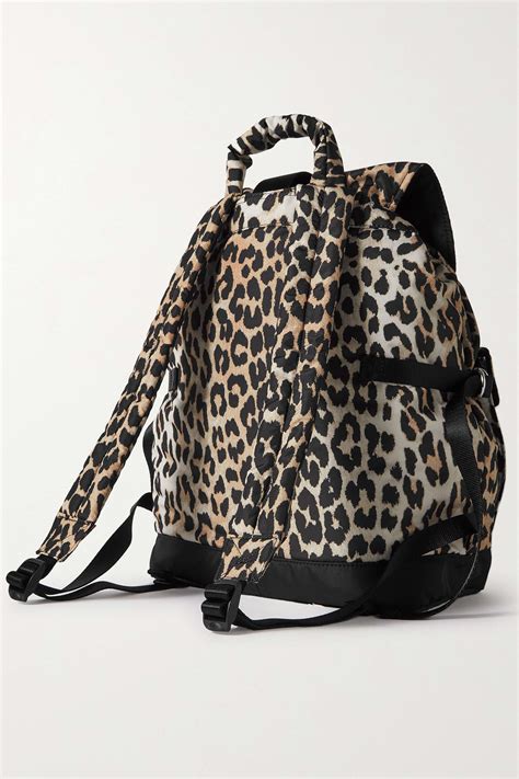 ganni leopard backpack.